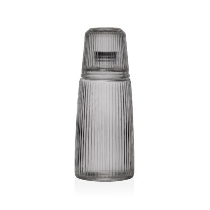 BLACK GLASS BOTTLE WITH CUP - Image 2